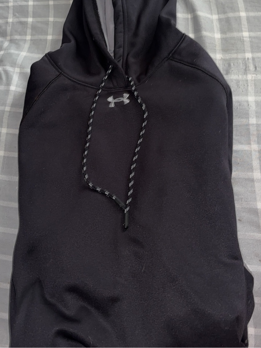Under Armour woman’s Black Pullover Hoodie with Reflective Logo